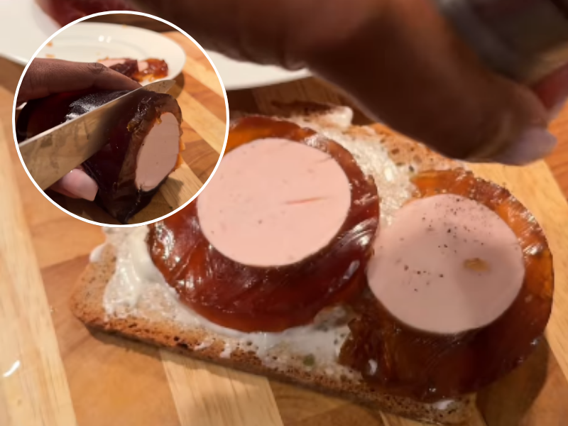 A woman slicing cold meat made with Coca Cola