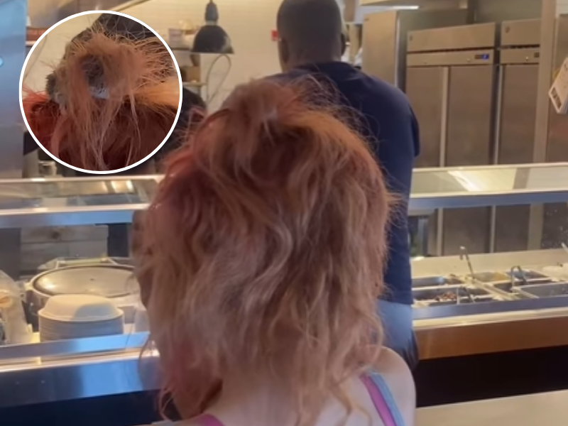 A woman with a mouse in her hair