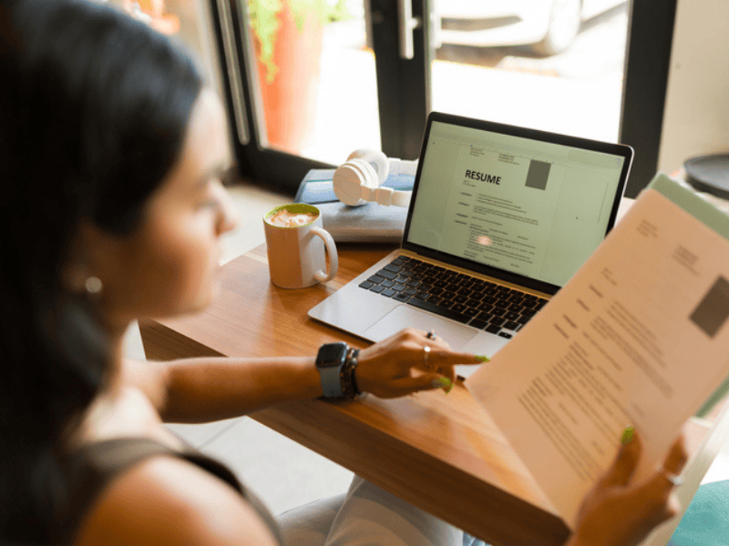A woman working on her resume