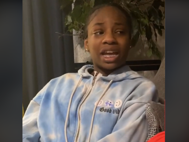 A young teenager with a hoodie upset