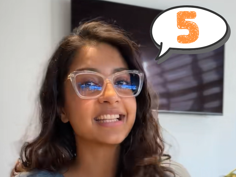 A young woman wearing spectacles sharing some tips