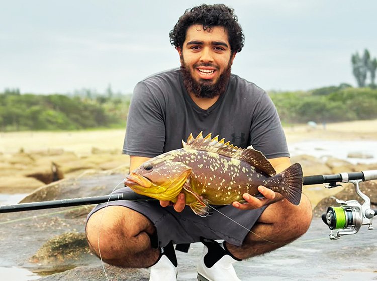 Abdullah Olla with a rockcod caught down the south coast