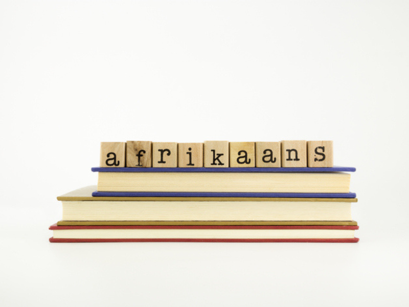 Afrikaans language word on wooden stamps