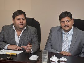 Ajay Gupta and younger brother Atul Gupta