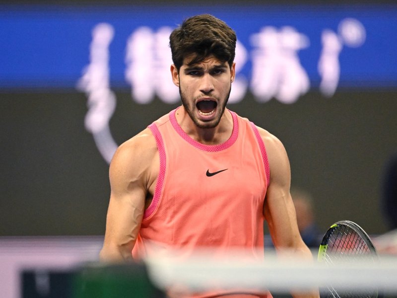 Spain’s Carlos Alcaraz reacts after winning his men’s singles semi-final match against Russia’s Daniil Medvedev at the China Open tennis