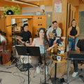 Alessia Cara performing with a band on Giant Desk