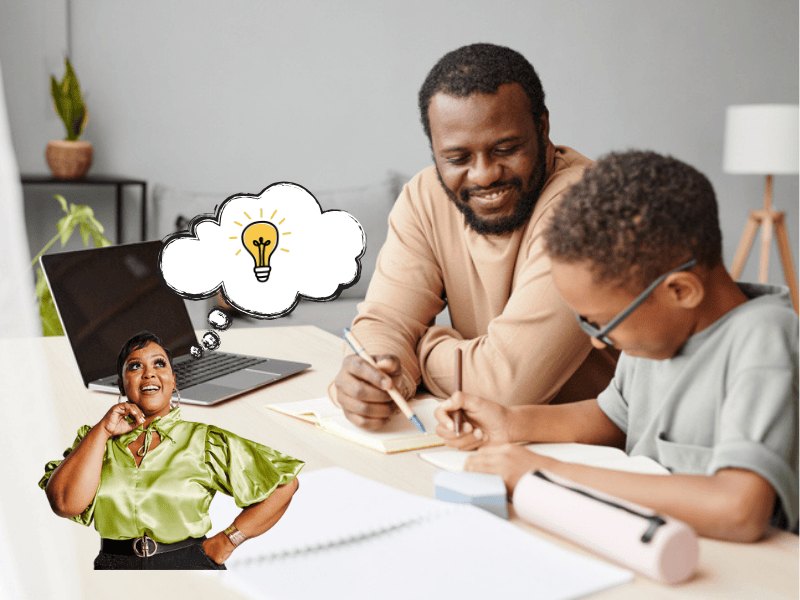 An African father working with his son as he does his homework