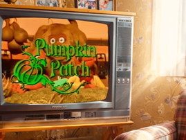 An old television set in a living room playing Pumpkin Patch