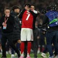 Arsenal manager Mikel Arteta hugs Bukayo Saka