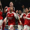 Arsenal players celebrate win