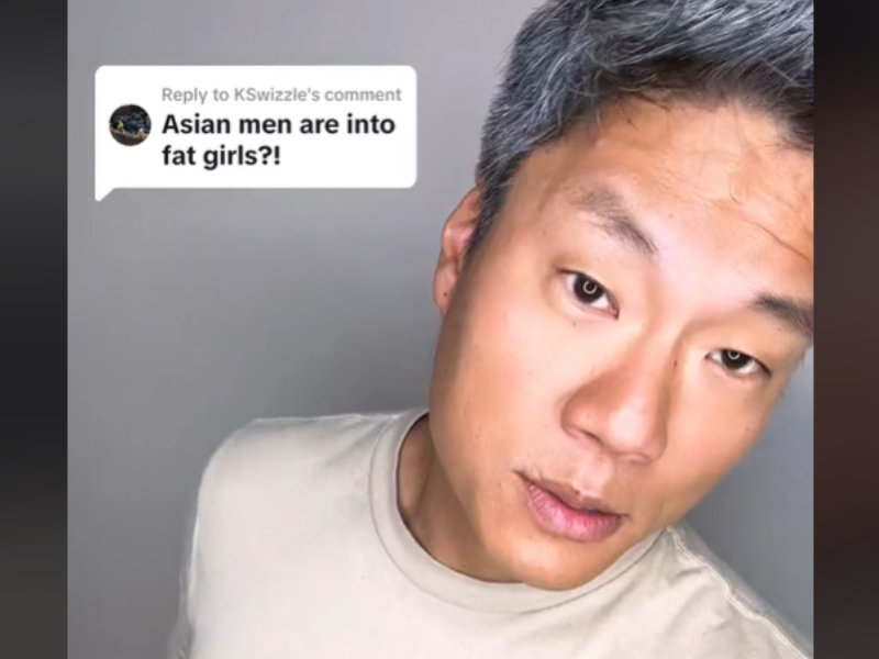 Asian man with silver grey hair