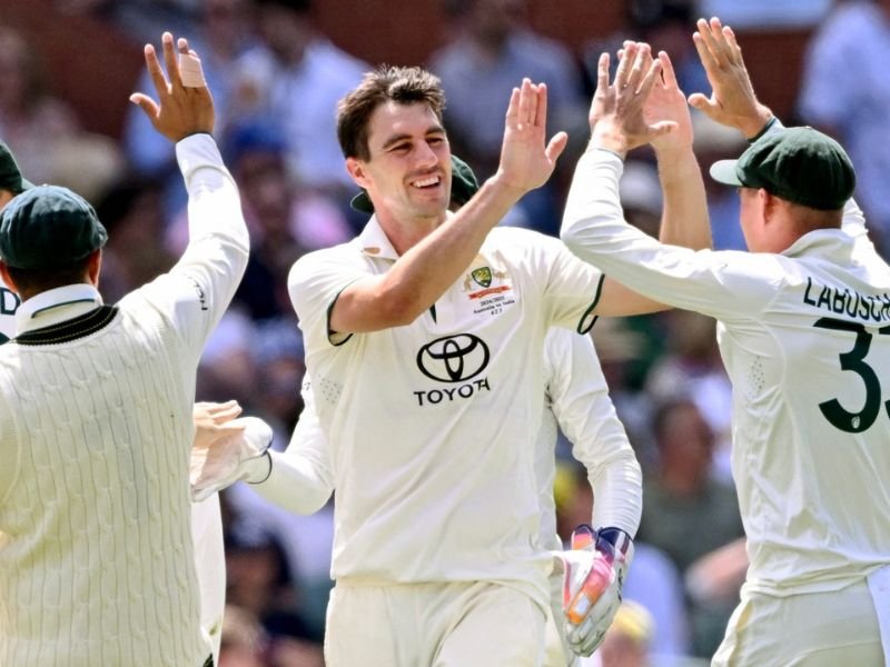 Pat Cummins celebrates taking a wicket on the third day of the second cricket Test match between Australia and India
