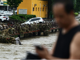 At least 11 killed, 27 missing in Beijing rainstorms