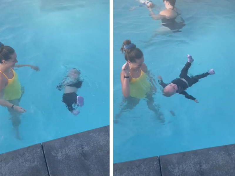 Baby floating in a swimming pool