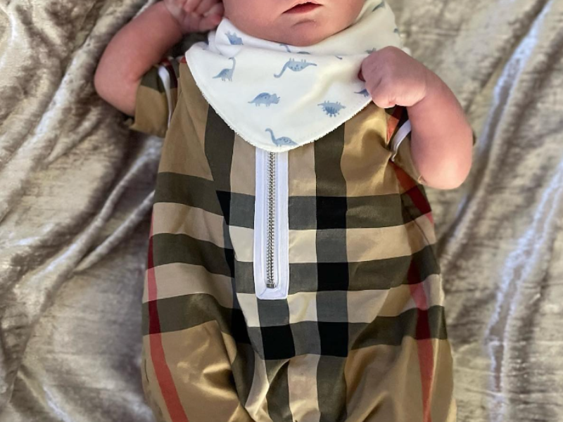 Baby wearing designer clothing