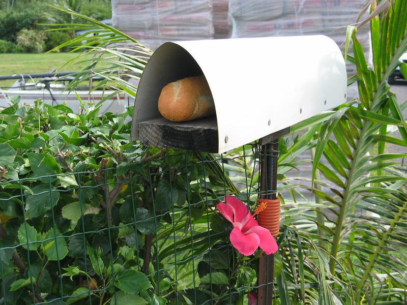 Tahitian residents have boxes outside their home that look like mail boxes but are actually for French bread delivery, and the fresh loaf gets delivered twice a day.