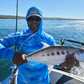 Bailey Hart with a queenfish caught off Umhlanga
