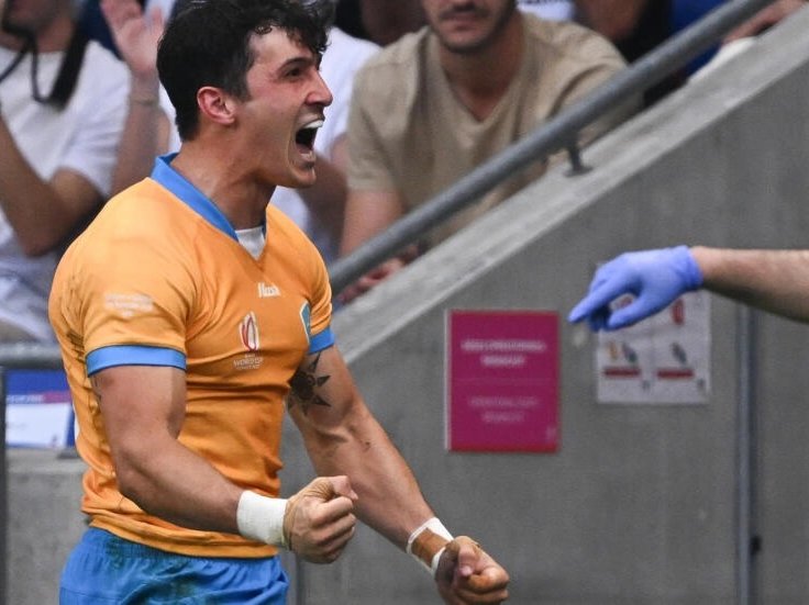 Full-back Baltazar Amaya celebrates after scoring his second try as Uruguay denied Namibia a first ever World Cup win in 26 attempts