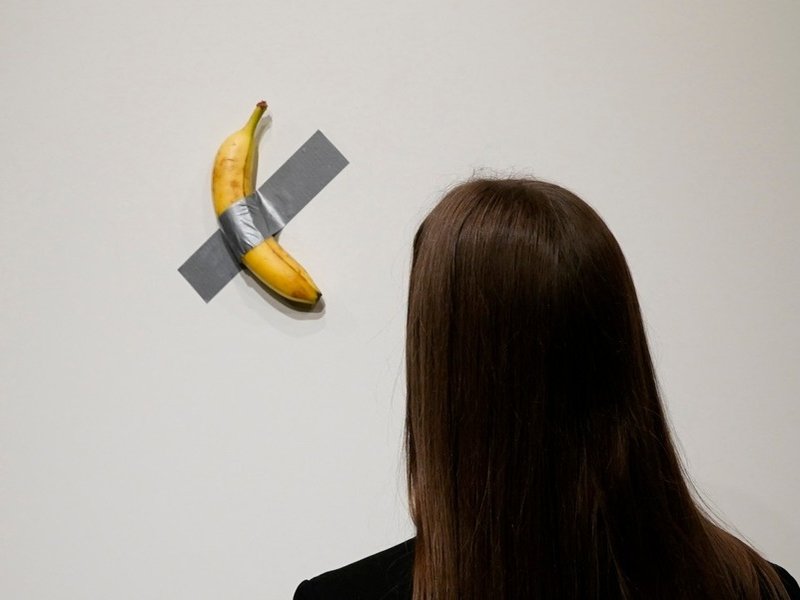 Banana taped to a wall