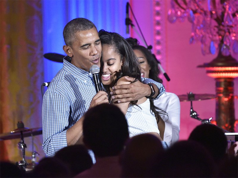 Barack sings to daughter