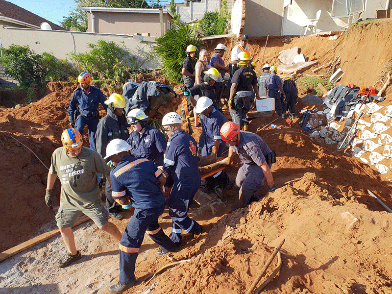 Emergency services rescue man trapped in Bluff wall collapse