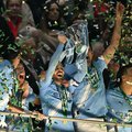 Manchester City midfielder Bernardo Silva lifts the Carabao Cup