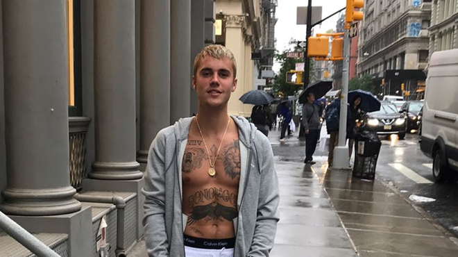 Justin Bieber bares his chest on the streets of New York