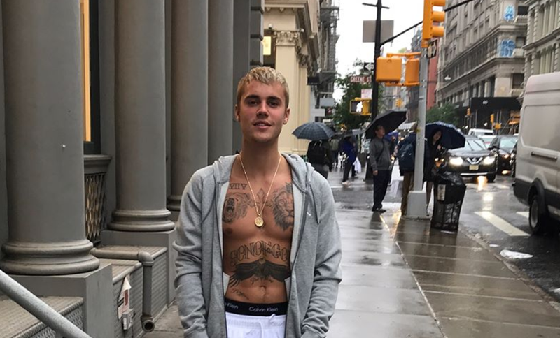 Justin Bieber bares his chest on the streets of New York