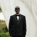 Black Coffee wearing black suit