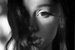 Black and white close up of Ariana Grande