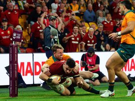 British and Irish Lions' Dan Sheehan scores a try under pressure from Australia's Harry Potter