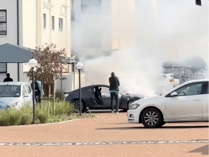 CHECKERS SIXTY60 DRIVERS PUTTING OUT CAR ON FIRE