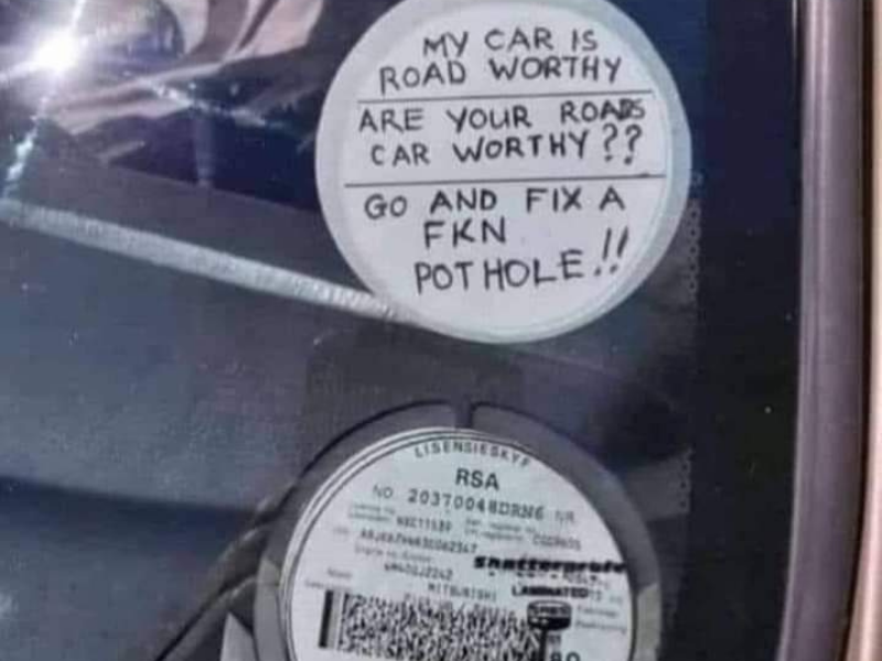 Car licence disc on a windscreen