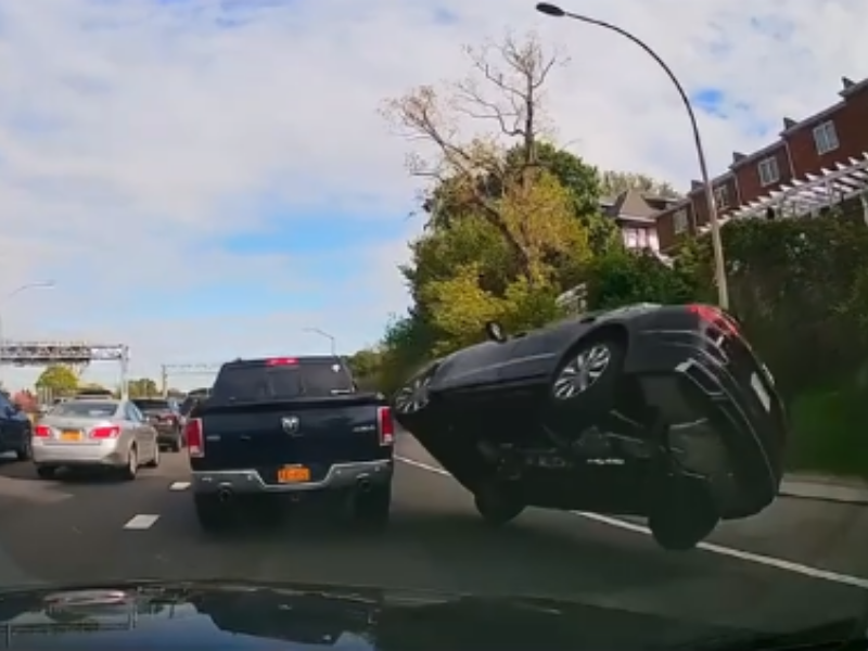 Car somersaults after bumping van on back bumper