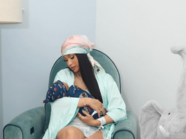 Cardi B stares lovingly at her newborn son