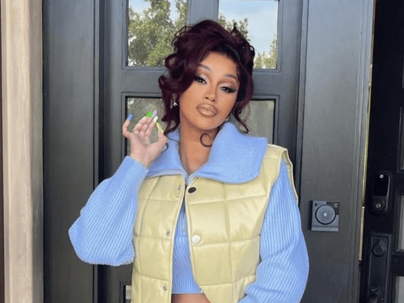 Cardi B wearing her hair in a curly up do