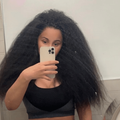 Cardi B shows off her real hair while taking a mirror selfie