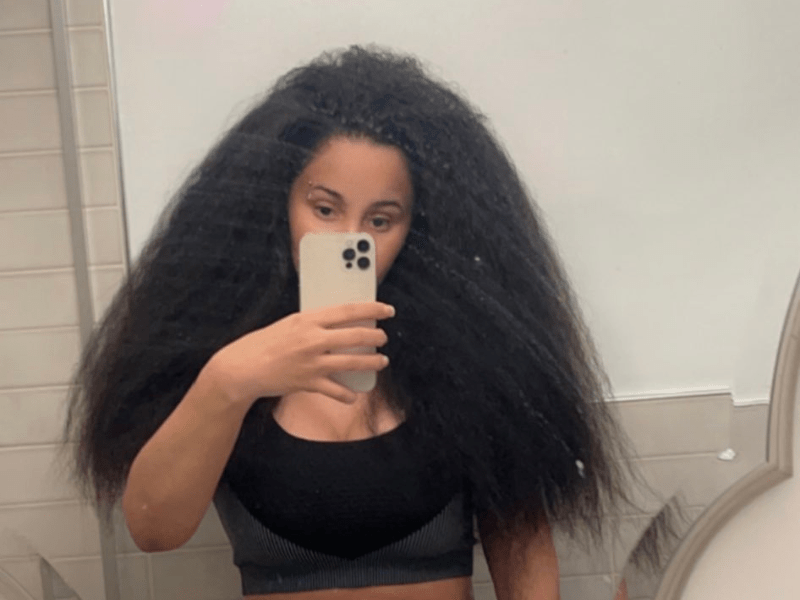 Cardi B shows off her real hair while taking a mirror selfie