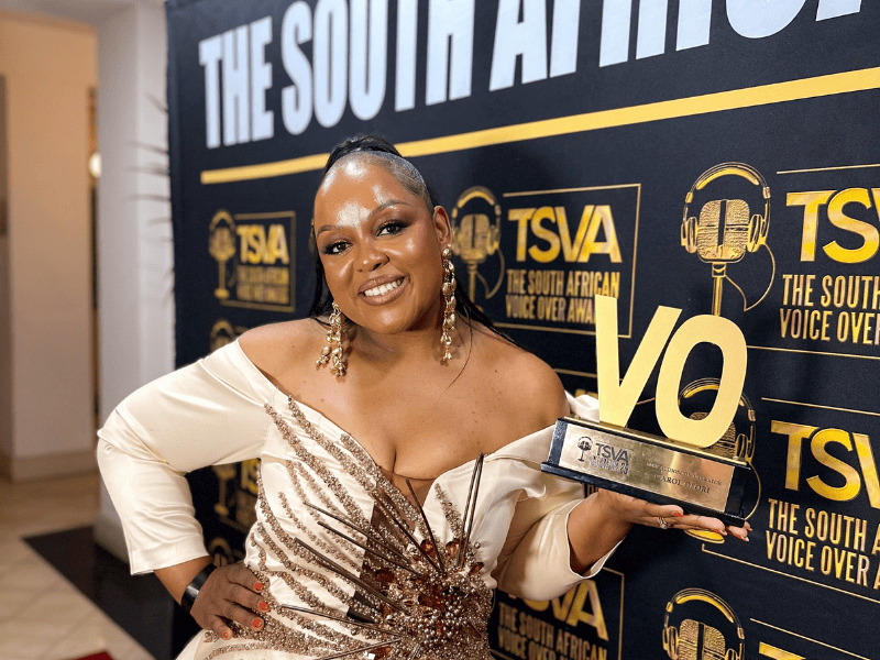 Carol Ofori holding her award at the South African Voice Over Awards