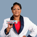 Carol Ofori holding up a toothpaste