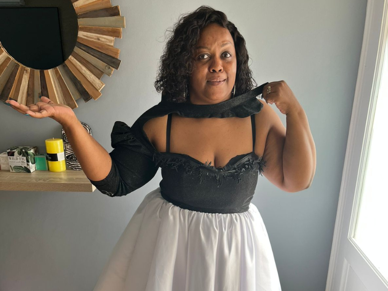 Carol Ofori posing in her botched up dress