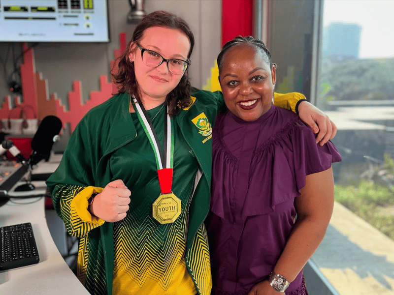 Carol Ofori posing with Abigail Deneys at the East Coast Radio studios