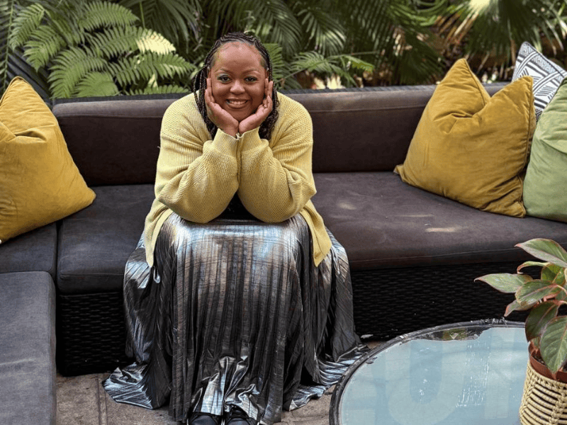 Carol Ofori sitting at Gatvol coffee shop