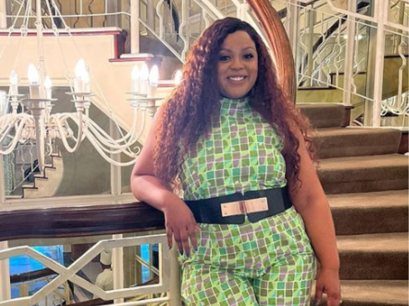 Carol Ofori standing on a staircase