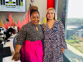 Carol Ofori stands at the East Coast Radio studios