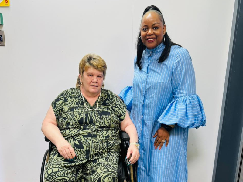 Carol Ofori stands next to Carlin Mynhardt at the East Coast Radio studios