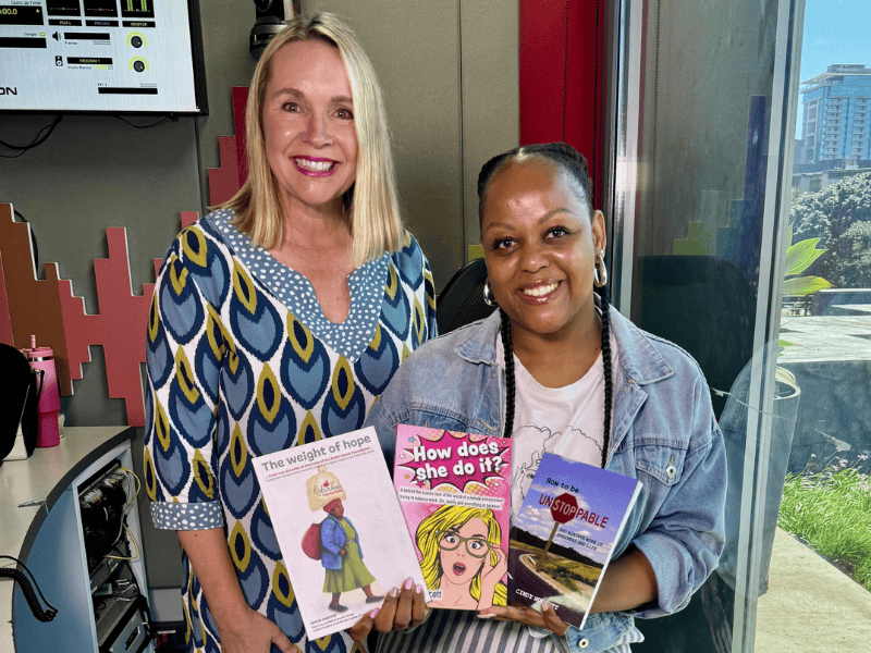 Carol Ofori stands with Cindy Norcott at the East Coast Radio studio