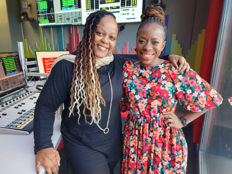 Carol Ofori stands with Similo Dlamini a para surfer