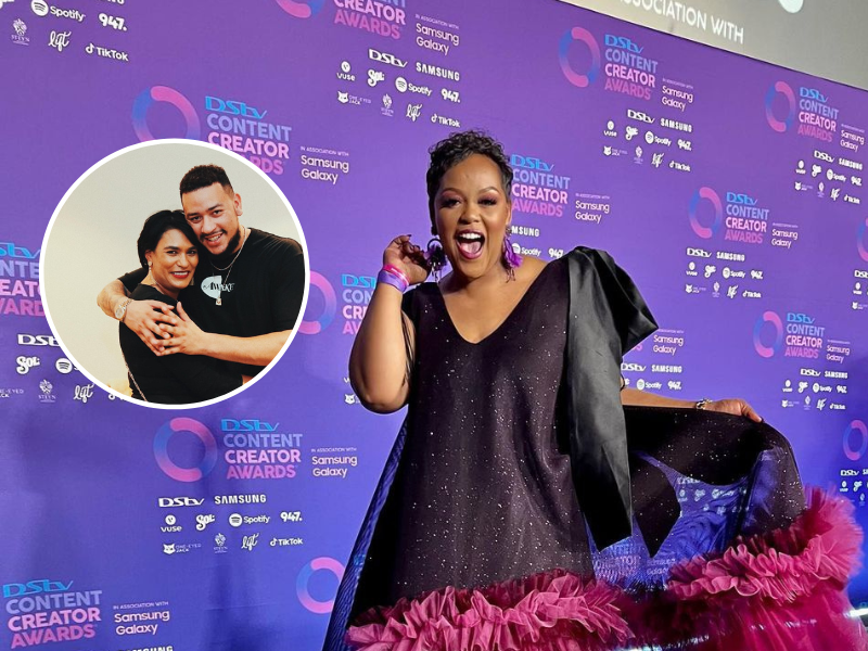 Carol Ofori wearing a black and pink dress on the red carpet