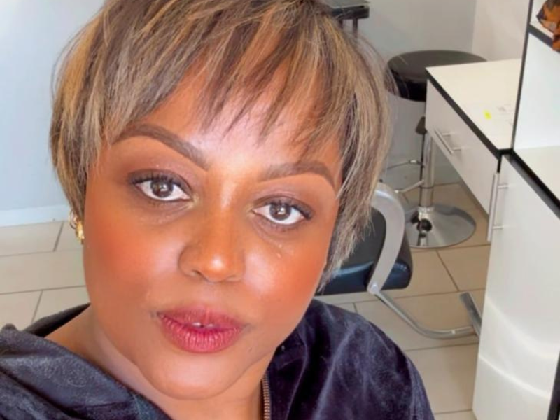 Carol Ofori with highlighted short hair at the salon